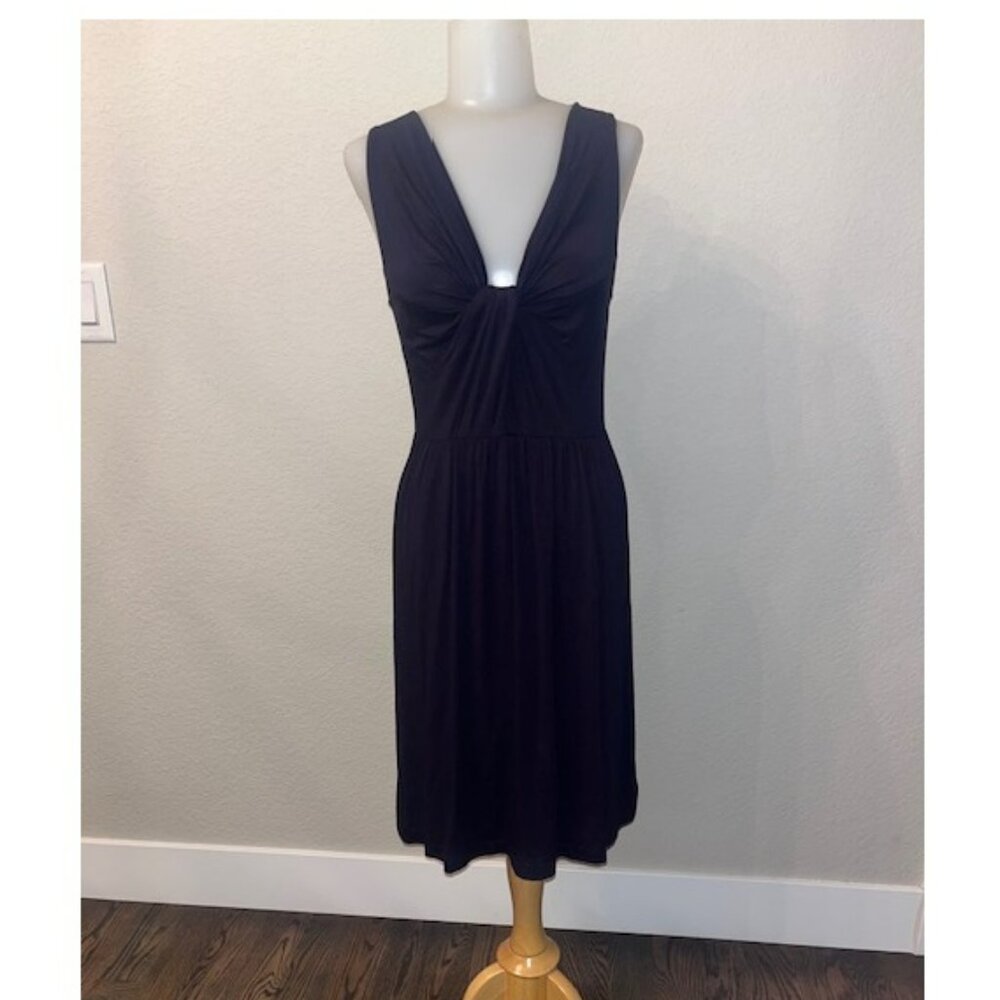 J Crew Navy blue, sleeveless, v-neckline, wrap silhouette, with bow accents